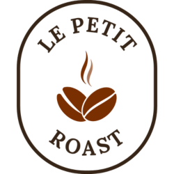 Le Tom Café logo featuring a stylized cat face emerging from a steaming coffee cup